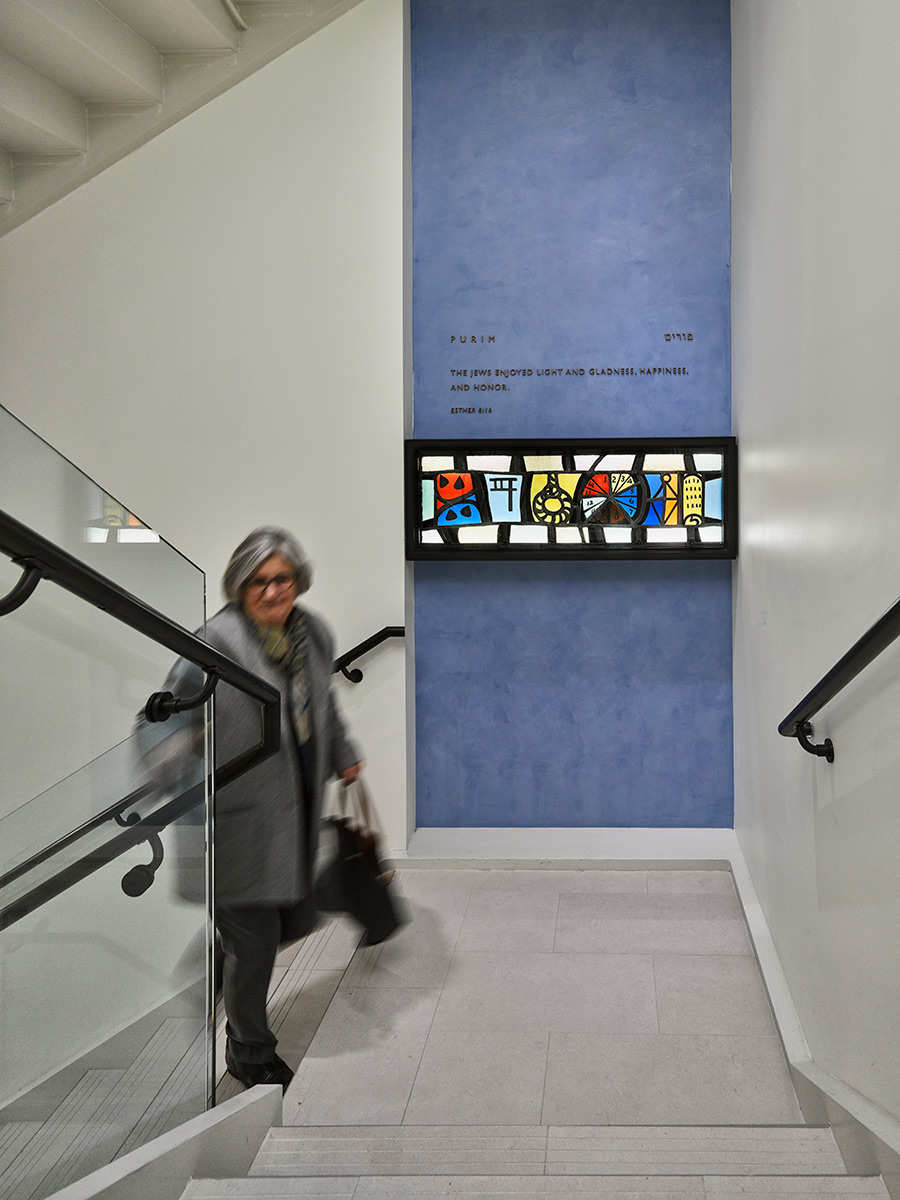 Stairwells feature stained glass window displays by Adolph Gottleib from 1954